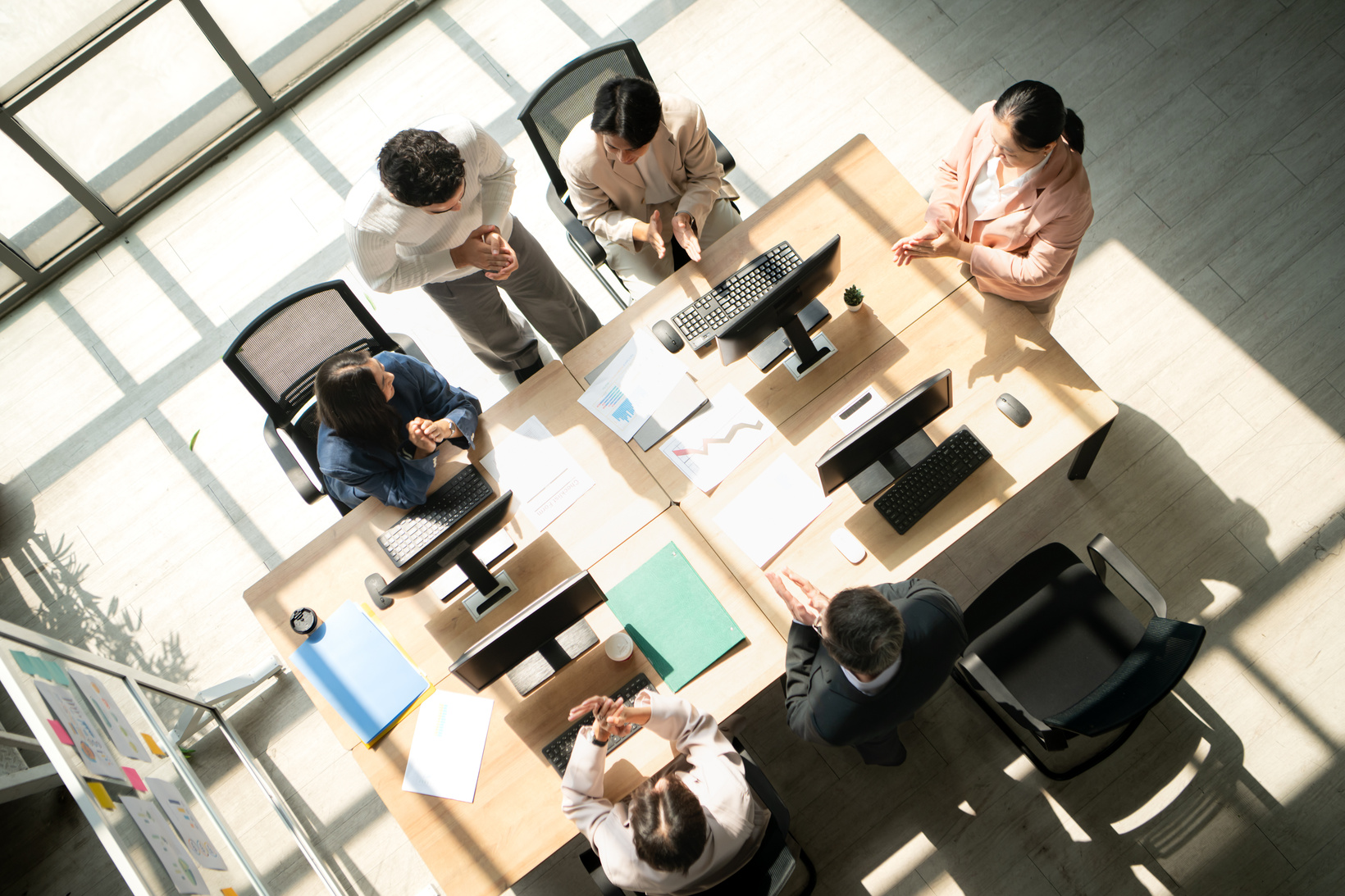 PrimeOps team in a modern office environment